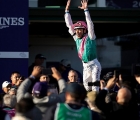 dettori-jump-after-the-victory-in-the-classic-turf-with-enable