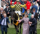Al Boum Photo and Paul Townend are led into the winner’s enclosure after winning the Gold Cup, 15 03 2019