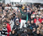 nico-de-boinville-is-triumphant-aboard-altior-after-the-champion-chase