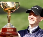 jye-mcneil-holds-the-melbourne-cup-trophy-aloft-3rd-nov-2020