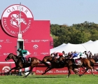 French jockey Mickael Barzalona riding Daryz (L) crosses the finish line to win the Qatar Prix de l'Arc de Triomphe horse race at the Longchamp race course, in Paris on October 4, 2026. 