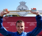 William Buick celebrates by displaying his Golden Whip Trophy after winning the Nassau Stakes 2018