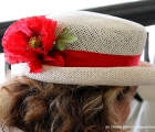 Un grazioso cappellino in tema coi colori del GP di Milano, il bianco e rosso