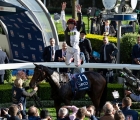 Frankie Dettori-executes-a-flying-dismount-following-his-250th-group-1-success