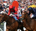 ryan-moore-and-tuesday-right-go-past-the-post-with-emily-upjohn-left-in-a-thrilling-cazoo-oaks-epsom-uk-03-06-2022