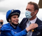 william-buick-and-charlie-appleby-embrace-after-combining-to-win-the-irish-derby