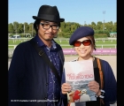 Due turisti giapponesi in visita all' Ippodromo di San Siro Galoppo durante la giornata del premio Federico Tesio